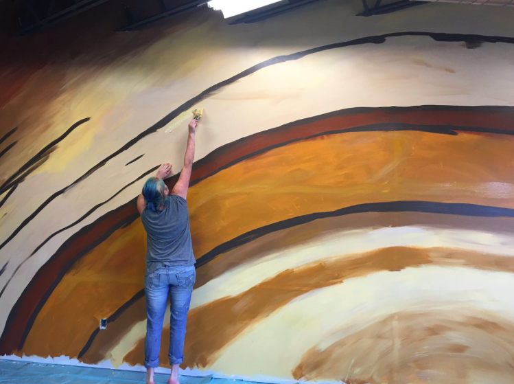 Tyler artist shares vision behind tree-inspired gym mural